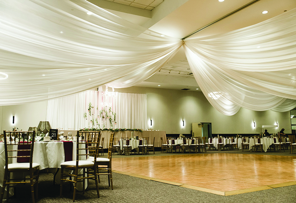The dance floor and decorated tables at Inwood Oaks, a new wedding venue in Oakdale owned by Mintahoe Catering & Events