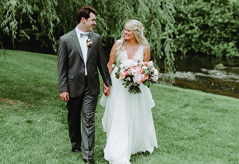 Kate and Lucas walk the grounds at Creekside Farm Weddings & Events