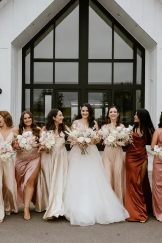 Multicolored mismatched dresses: on trend perfect for all body types and skin tones. ~ Candace Holmstadt, 651 Studio Floral | Photo: Stephanie Marie Photography, Venue: Woodhaven 